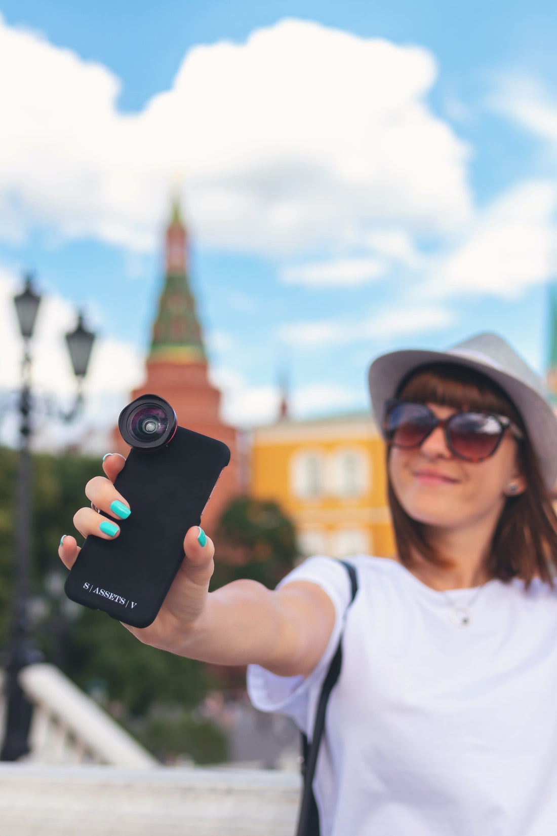 A Woman Holding Mobile Phone To Take Selfie